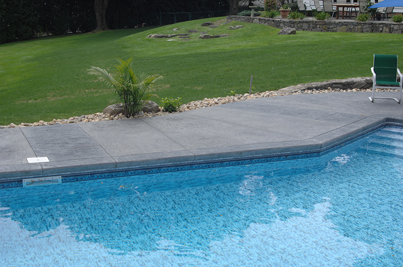 Swimming pool and stamped concrete project example 96